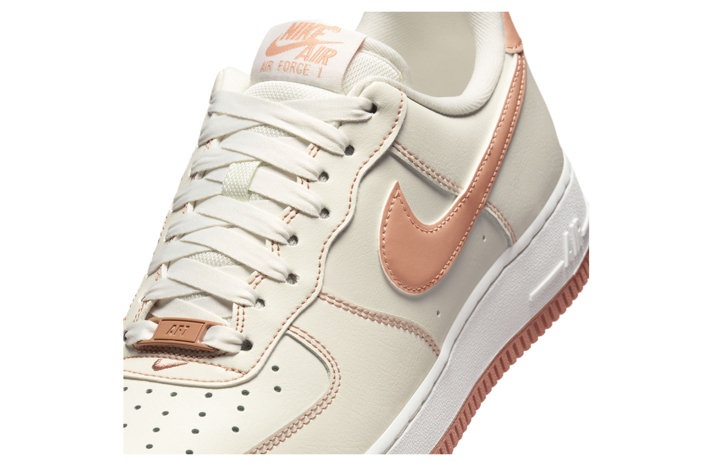 white nike with rose gold swoosh