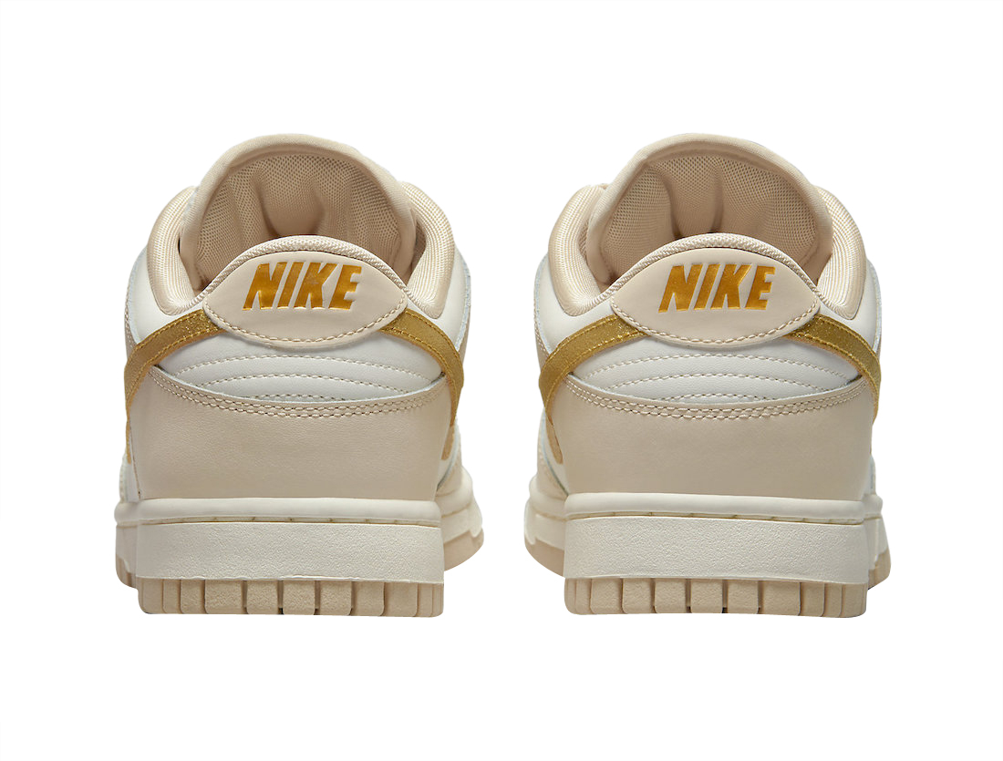 gold swoosh nike