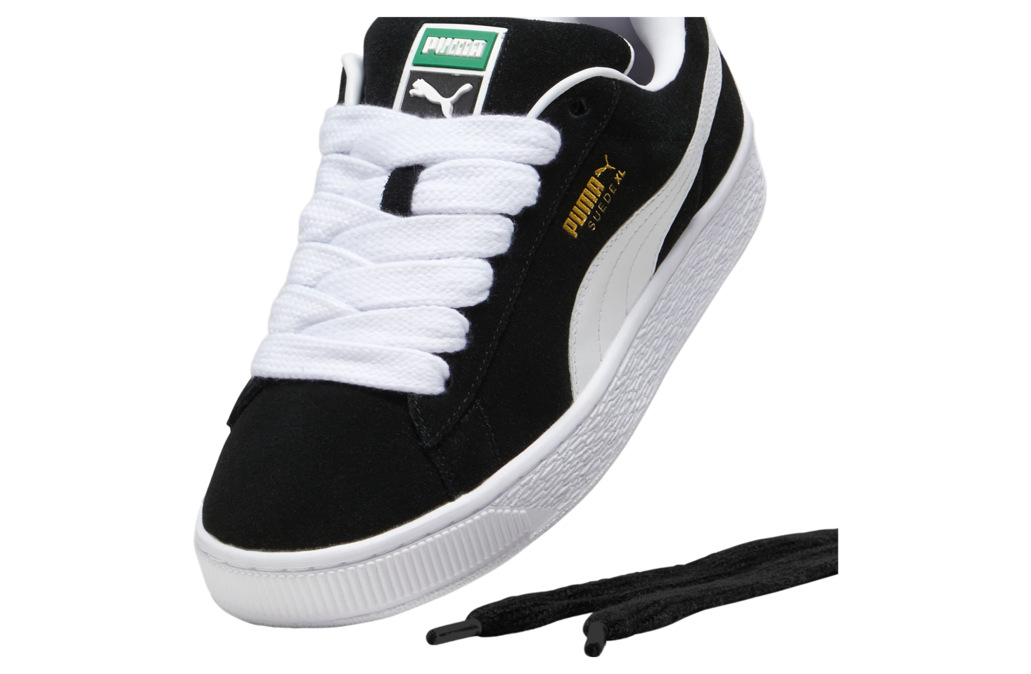 Puma suede shoes black and white best sale